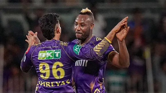 Kolkata Knight Riders' Mitchell Starc with teammates celebrates after taking the wicket of Sunrisers Hyderabad batter Abhishek Sharma during the Indian Premier League (IPL) 2024 final cricket match between Sunrisers Hyderabad and Kolkata Knight Riders at MA Chidambaram Stadium, in Chennai, Sunday, May 26, 2024.