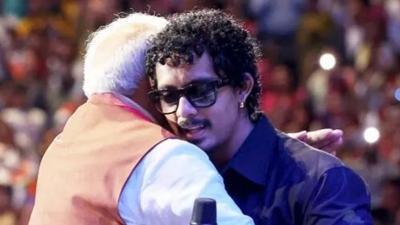 Prime Minister Narendra Modi with rapper Sooraj Cherukat aka Hanumankind during an Indian community event, in New York, USA