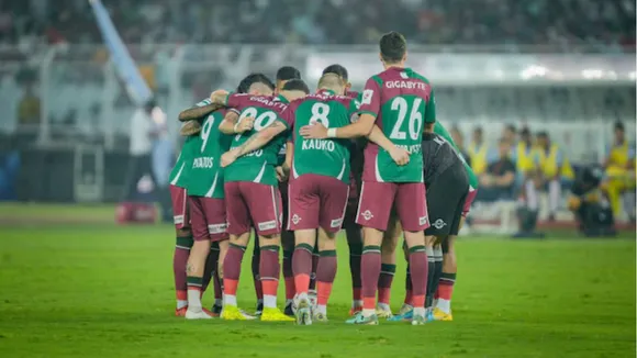 Mohun Bagan SG players in a huddle
