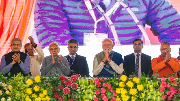 Prime Minister Narendra Modi with Uttar Pradesh Governor Anandiben Patel, Chief Minister Yogi Adityanath and others during a public meeting, in Ayodhya, Saturday, Dec. 30, 2023
