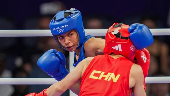 India's Nikhat Zareen (in blue) and China's Wu Yu during their women's 50kg Round of 16 boxing match at the 2024 Summer Olympics, in Paris, France, Thursday, Aug. 1, 2024.