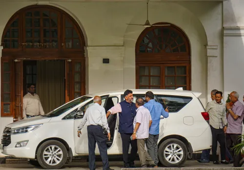 Karnataka Congress President DK Shivakumar arrives at the residence of the party's President Mallikarjun Kharge, in New Delhi
