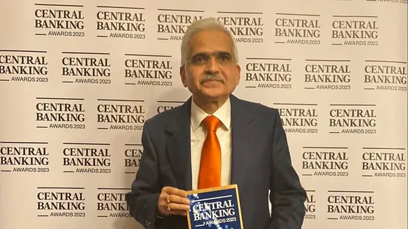 Reserve Bank of India (RBI) Governor Shaktiknata Das poses for photos after receiving the 'Governor of the Year' award by Central Banking, in London