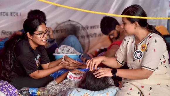 Junior doctors during their hunger strike against the alleged rape and murder of a trainee doctor, in Kolkata