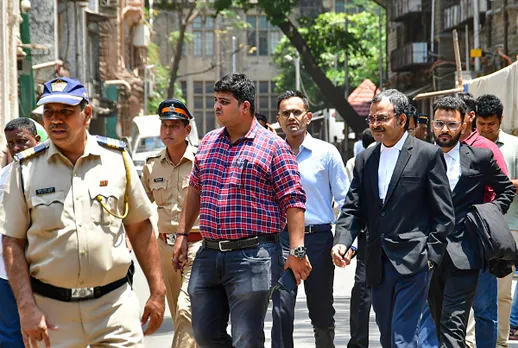 Former Zonal Director of Mumbai Narcotics Control Bureau Sameer Wankhede being escorted outside the Bombay High Court, in Mumbai