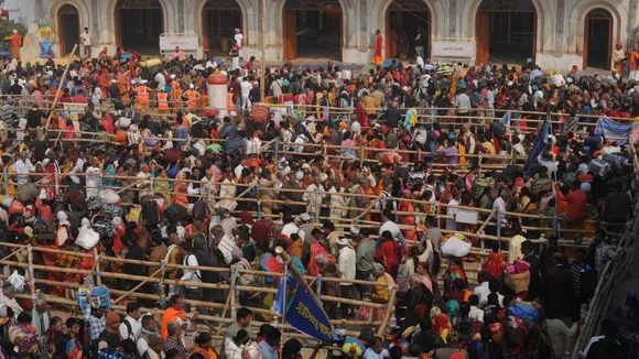 Devotees taking holy dip at Gangasagar the confluence of River Ganga and Bay of Bengal on the occasion of Makar Sankranti