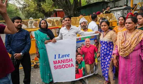 Manish Sisodia poster at Delhi school