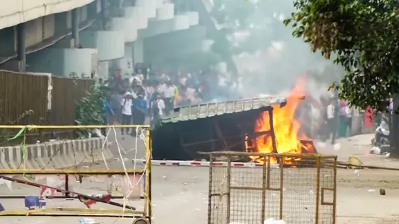 Security personnel during a clash with students who were protesting over recent violence, Imphal, Tuesday, Sept. 10, 2024.