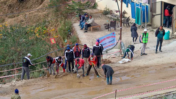 Border Roads Organisation (BRO) officials prepares a road outside the Silkyara Bend-Barkot Tunnel during the ongoing rescue operation