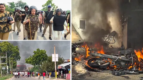 Motorbikes burnt following Sunday night violence during goddess Durga idol immersion, in Bahraich, Monday, Oct. 14, 2024.