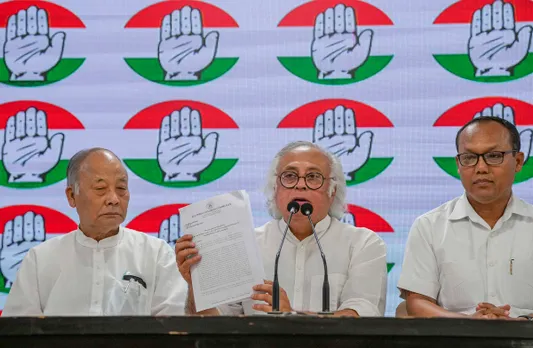 AICC General Secretary Jairam Ramesh with Congress leader from Manipur Okram Ibobi (left) and party MLA Keisham Meghachandra Singh (right) addresses a press conference, at AICC headquarters in New Delhi
