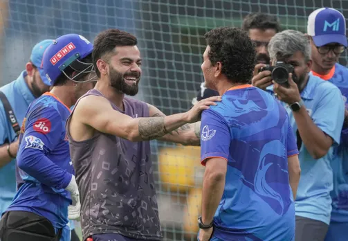 Royal Challengers Bangalore player Virat Kohli with Mumbai Indians mentor Sachin Tendulkar during a practice session