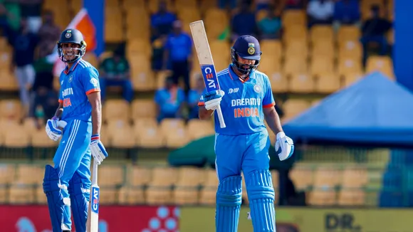 Rohit Sharma celebrates his half-century during the Asia Cup match between India and Pakistan, in Colombo