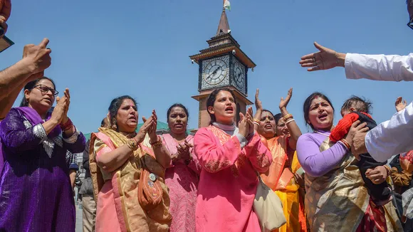 Kashmiri Pandits participate in a religious procession on the occasion of 'Ram Navami' festival, in Srinagar, Wednesday, April 17, 2024.