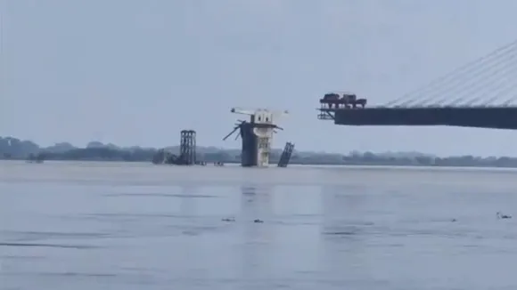 A superstructure of Pillar number 9 of the under-construction Sultanganj-Aguwani Ghat bridge collapses