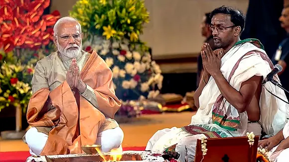 Prime Minister Narendra Modi performs 'havan' during the inauguration of the International Exhibition-cum-Convention Centre (IECC) complex at Pragati Maidan, in New Delhi