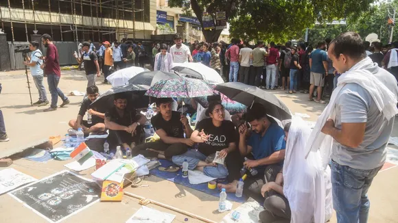 Students stage a protest after three civil services aspirants died due to drowning at a coaching centre in Old Rajinder Nagar area, in New Delhi, Tuesday, July 30, 2024