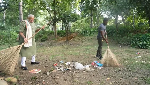 Prime Minister Narendra Modi with wrestler Ankit Baiyanpuriya participates in a cleanliness drive organised under the 'Swachchta Pakhwada: Swachchta hi Seva' campaign