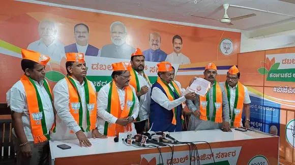 K Eshwarappa burns Congress manifesto