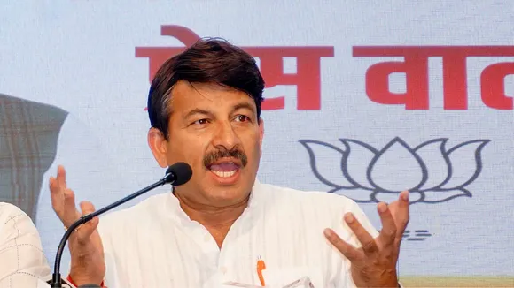 Delhi BJP party candidate Manoj Tiwari address a press conference ahead of Lok Sabha elections, in New Delhi, Friday, April 5, 2024
