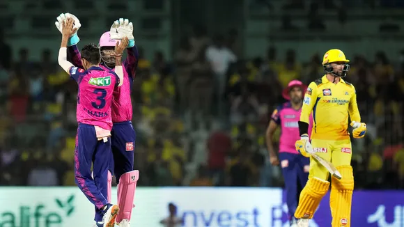 Rajasthan Royals bowler Yuzvendra Chahal celebrates with teammate the wicket of Chennai Super Kings batter Devon Conway at Chidambaram Stadium on April 12