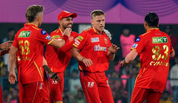 Punjab Kings players celebrate a wicket of Rajasthan Royals during the IPL 2023 cricket match between Rajasthan Royals and Punjab Kings at ACA Stadium Barsapara in Guwahati on April 5