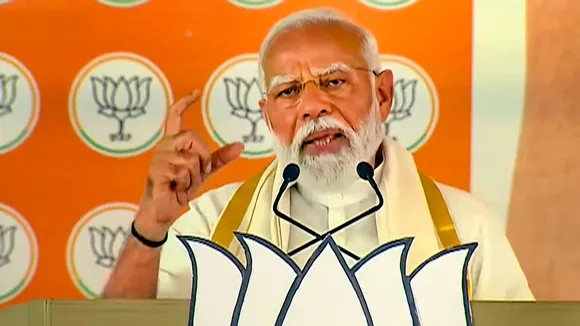 Prime Minister Narendra Modi at a public meeting, ahead of Lok Sabha elections, in Alathur, Kerala