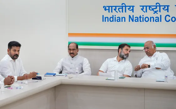 Congress President Mallikarjun Kharge with party leader Rahul Gandhi and Telangana Congress President Revanth Reddy (left) during a meeting at the AICC headquarters, in New Delhi