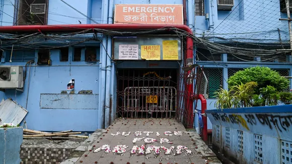 'Justice For Abhaya' is written with floweres in front of the emergency building at RG Kar Medical College and Hospital as junior doctors cease work against the alleged rape and murder of a trainee doctor, in Kolkata, Monday, Sept. 8, 2024.