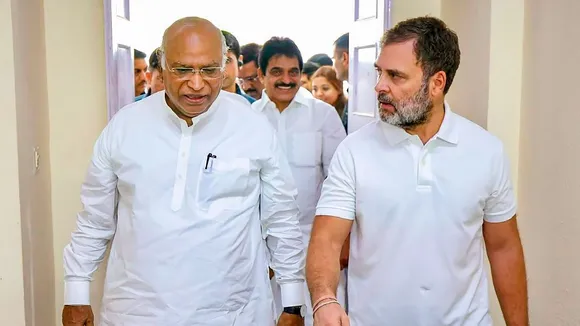 Congress President Mallikarjun Kharge with party leader Rahul Gandhi arrives to attend a meeting of the party's General Secretaries, State In-Charges, and State Presidents, in New Delhi, Tuesday, Aug. 13, 2024.