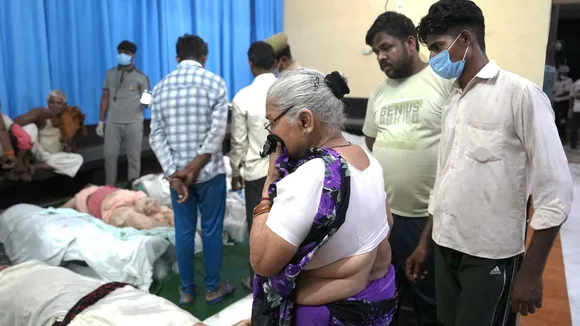 Relatives of victims of the Hathras stampede at Bagla District Hospital, in Hathras, Tuesday, July 2, 2024