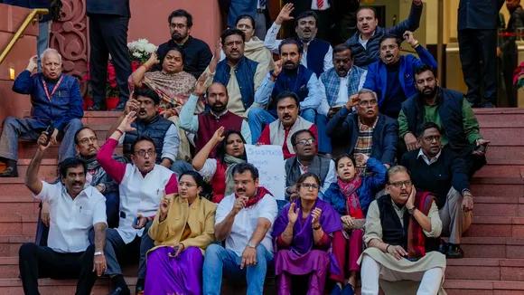 Suspended Opposition MPs protest during the Winter session of Parliament, in New Delhi