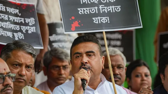 Leader of the Opposition in West Bengal Assembly Suvendu Adhikari speaks during a sit-in 'dharna' against the state government over the Sandeshkhali incident, in Kolkata