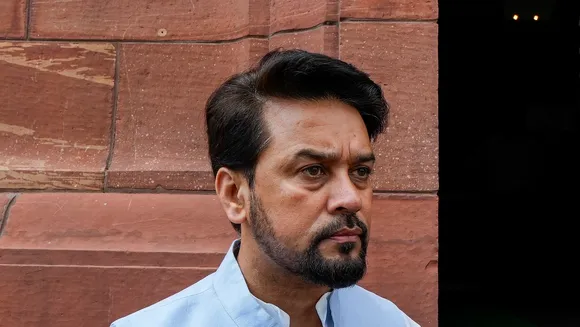 Union Minister Anurag Thakur talks to the media during the Monsoon session of Parliament, in New Delhi