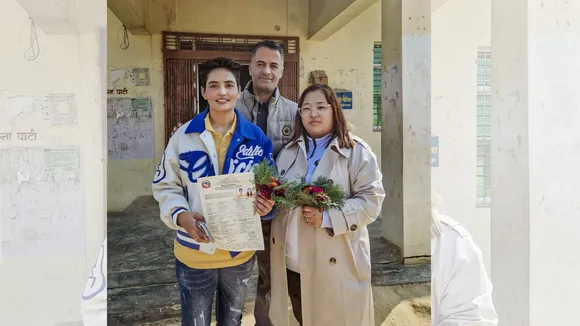 Anju Devi Shrestha and Suprita Gurung pose for photos after they became the first lesbian couple in South Asia to officially register their marriage