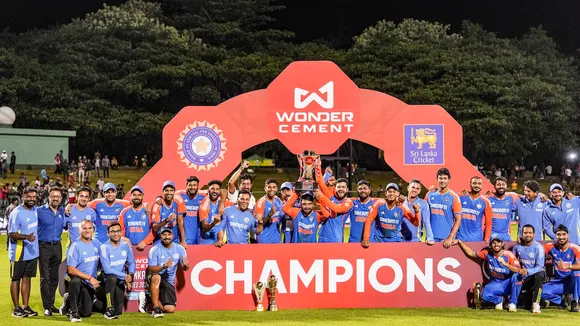 Indian players pose with the trophy after winning the 3-match T20 International cricket series over Sri Lanka, at the Pallekele International Cricket Stadium in Pallekele, Tuesday, July 30, 2024.