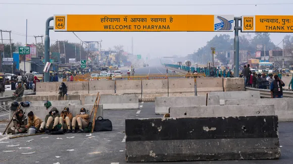 Concrete barricades put up at Singhu border in view of farmers' protest march, in New Delhi, Tuesday, Feb. 13, 2024.