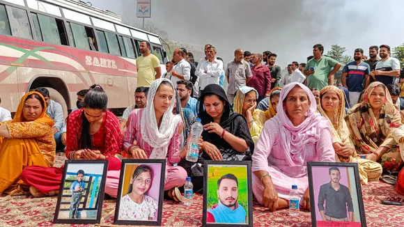 Families of Dhangri terror attack victims block the Jammu-Rajouri-Poonch National Highway during their protest demanding justice, at Muradpur Chowk in Rajouri