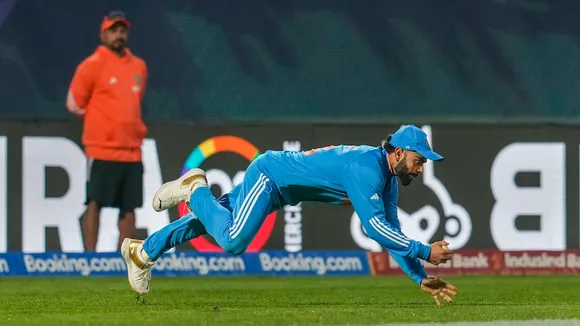 India's Virat Kohli takes catch of New Zealand's Mark Chapman during the ICC Men's World Cup ODI cricket match between India and New Zealand at the HPCA Stadium, Dharamshala, Sunday, Oct. 22, 2023.