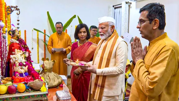 Prime Minister Narendra Modi attends 'Ganpati Poojan' at the residence of Chief Justice of India DY Chandrachud, in New Delhi, Wednesday, Sept. 11, 2024.