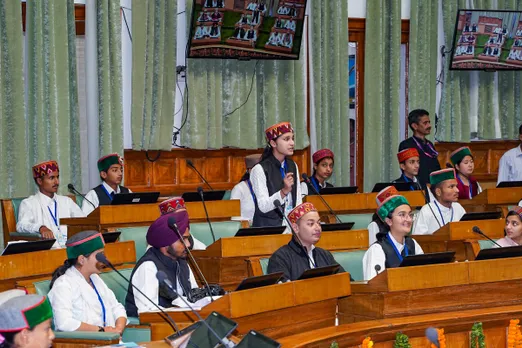 Children dressed as legislators and ministers take part in the special children session of Vidhan Sabha, in Shimla