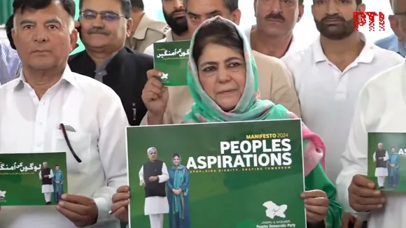 Former Jammu and Kashmir CM and PDP supremo Mehbooba Mufti along with other PDP leaders, releases her party manifesto in Srinagar