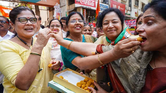 BJP workers celebrate after the central government notified the rules for implementation of the Citizenship (Amendment) Act, 2019, in Nagpur, Tuesday, March 12, 2024