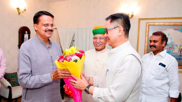 Union Parliamentary Affairs Minister Kiren Rijiju with Ministers of State Arjun Ram Meghwal and L Murugan greets Bhartruhari Mahtab before his swearing-in ceremony as the pro-tem Speaker of the Lok Sabha, in New Delhi.