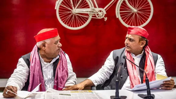 Samajwadi Party President Akhilesh Yadav along with party MP Awadhesh Prasad addresses party workers, at the party's state headquarters, in Lucknow, Tuesday, July 16, 2024.
