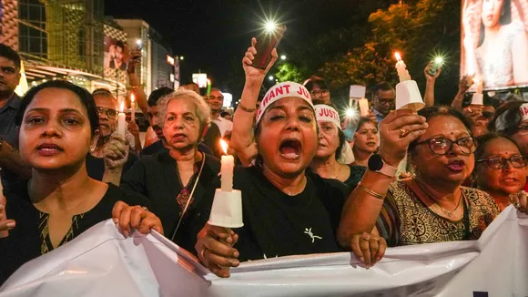 People during a candlelight march in protest against the alleged rape and murder of a trainee woman doctor at the RG Kar Medical College and Hospital, in Kolkata, Wednesday, Sept. 4, 2024.