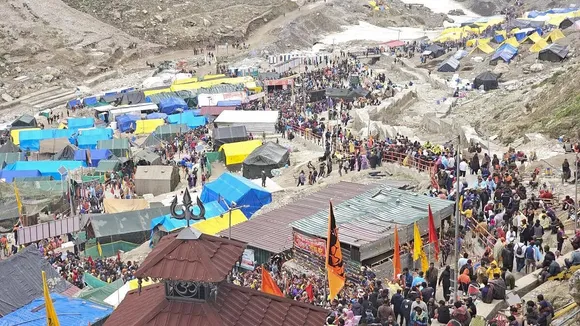 Devotees arrive at the Amarnath Temple to offer prayers during the annual ‘Amarnath Yatra’.