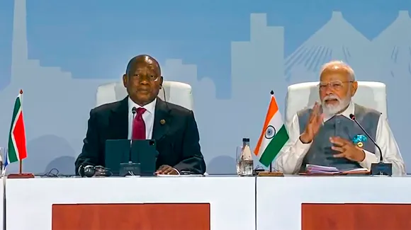 Prime Minister Narendra Modi speaks at the 15th BRICS Summit, in Johannesburg, South Africa, Thursday, Aug. 24, 2023. President of South Africa Cyril Ramaphosa is also seen.