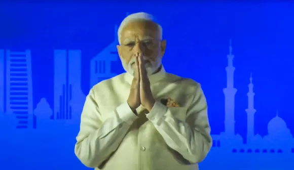 Narendra Modi speaks during the 'Ahlan Modi' programme, in Abu Dhabi, UAE, Tuesday, Feb. 13, 2024.
