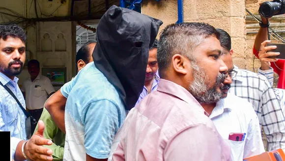 Accused Harish Balkram being produced at Esplanade court in Baba Siddiqui murder case, in Mumbai, Tuesday, Oct. 15, 2024.